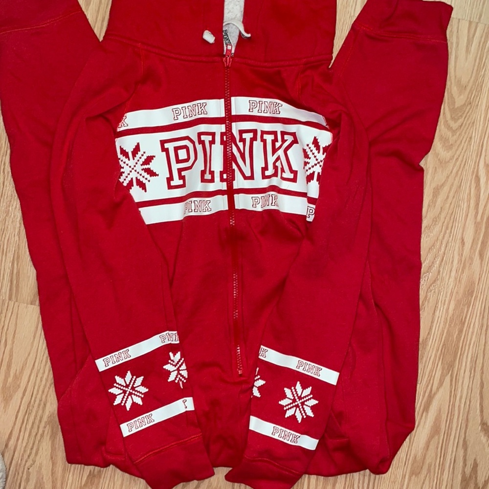 Pink onesie with Sherpa hood and pockets